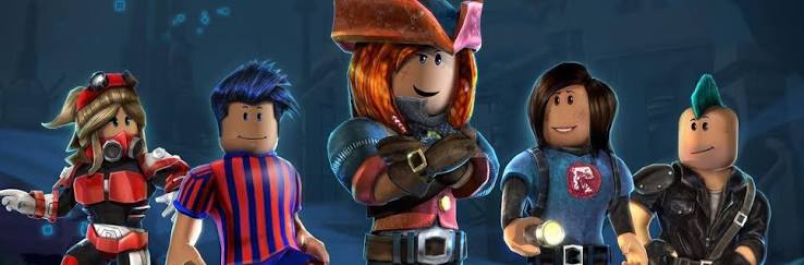 How to Play Roblox on Now GG Roblox Without Downloading (Complete Guide) Five Roblox avatar characters with colorful outfits standing together