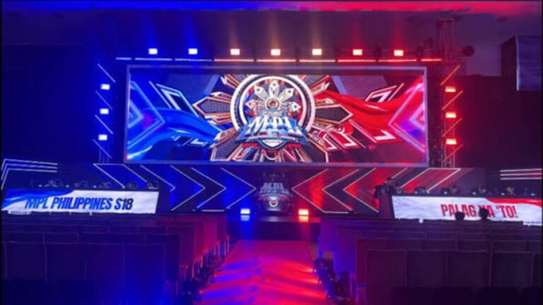 MPL PH Season 18: Full Schedule, Standings & Analysis MPL Philippines Season 18 esports stage with blue and red neon lighting