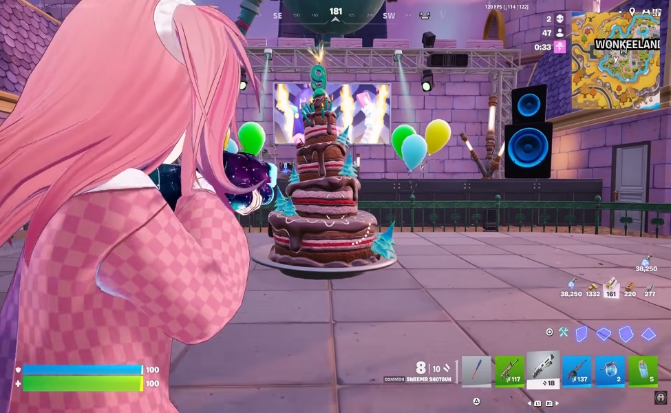 Fortnite Birthday 2026 celebration venue with giant cake and colorful balloons