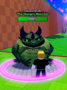 The Hungry Monster with glowing green eyes facing a player character in a game