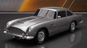 Silver Aston Martin DB5 Vantage classic sports car on dark background