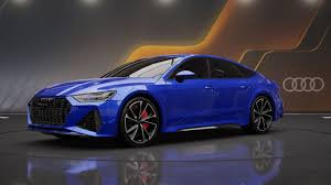 Blue Audi RS7 Sportback luxury sports car on display with gold accents