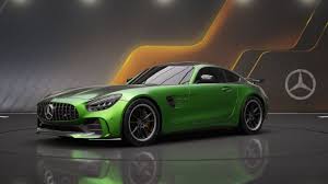 Green Mercedes-AMG GT R Coupe sports car with dynamic lighting effect