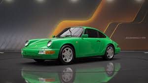 Green Porsche 911 Carrera sports car displayed against brown background