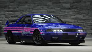 Blue and purple Nissan Skyline R sports car with racing livery