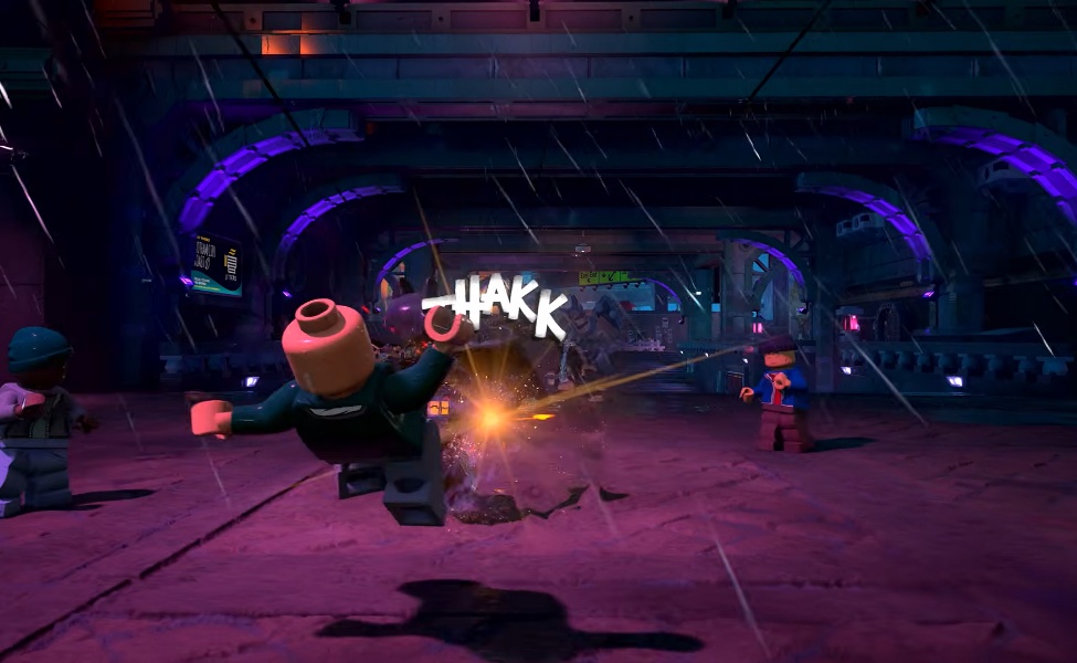 LEGO Batman character engaging in combat with explosive action effects in gameplay scene
