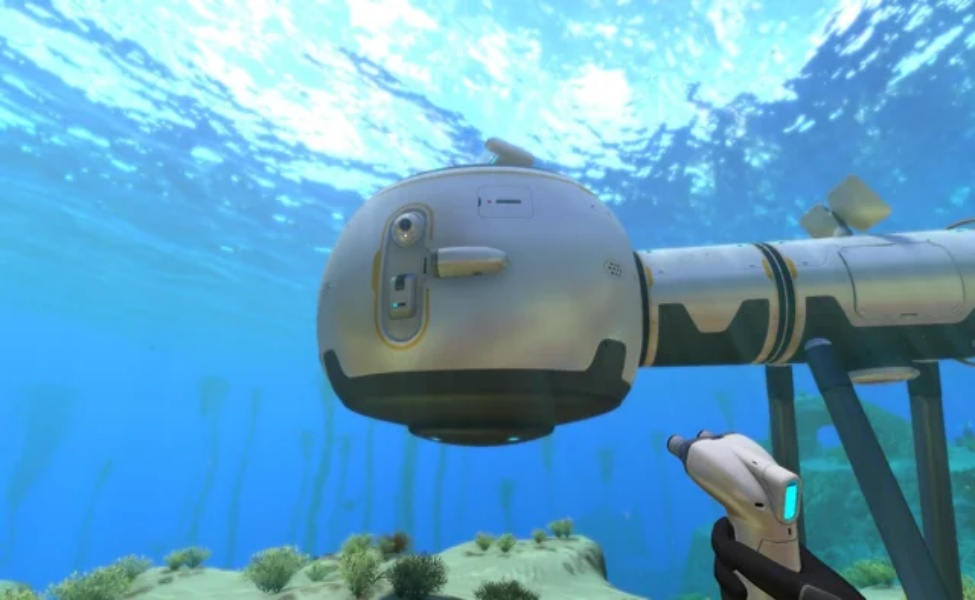 Underwater scanner room with spherical pod and viewing window in Subnautica 2