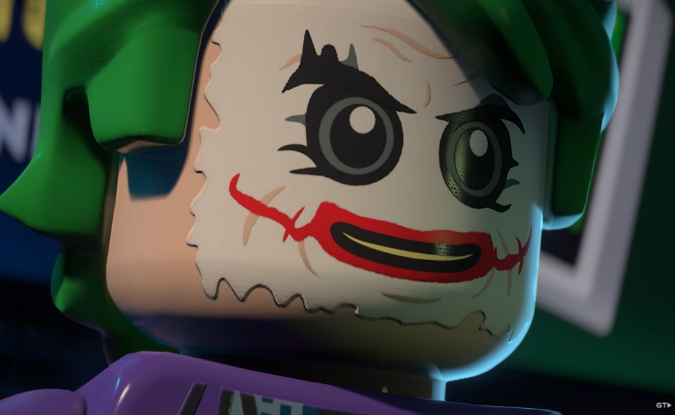 LEGO Batman character with painted face and green hood in Legacy of the Dark Knight