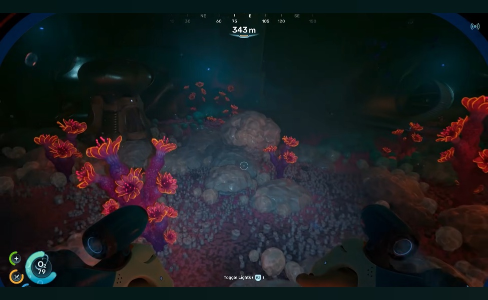 Underwater view of the Power Plant Biome with bioluminescent coral and rocky formations at 343