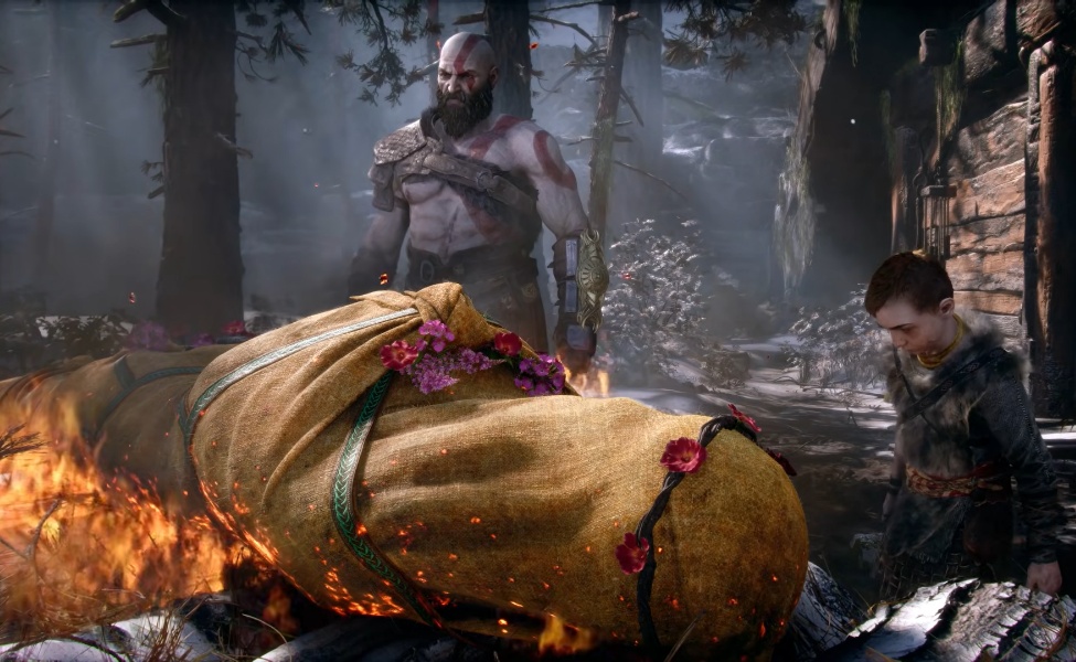 Kratos stands in misty Norse forest while boy observes decorated log in God of War ceremonial scene