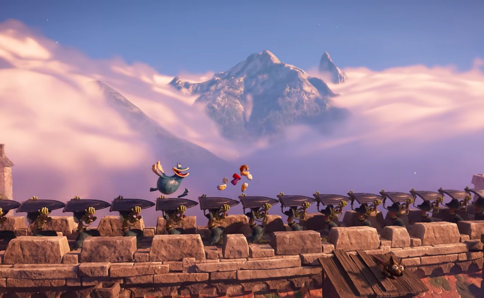 Rayman character jumping across stone platforms with snowy mountain landscape in background