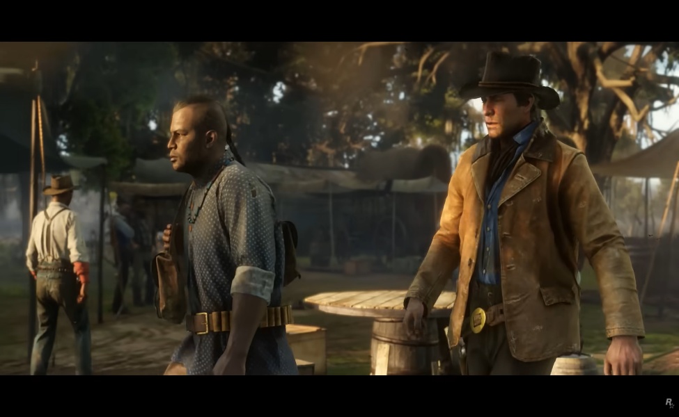 Two cowboys in period clothing standing in a dusty Western town setting
