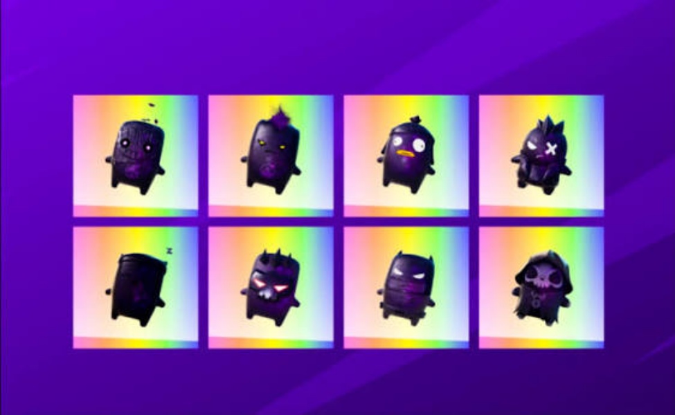 Eight dark cube sprite variants with glowing eyes displayed in a rainbow gradient grid layout