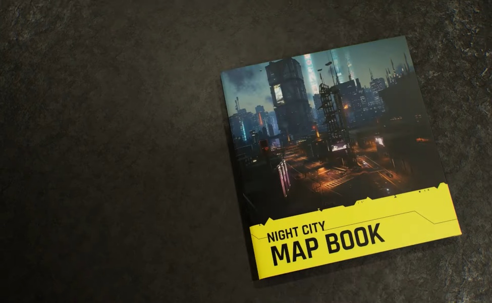 Night City Map Book from Cyberpunk 2077 The Board Game on concrete surface
