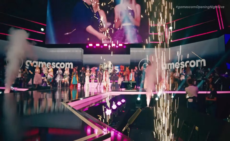 Gamescom opening night stage with performers and colorful neon lighting effects
