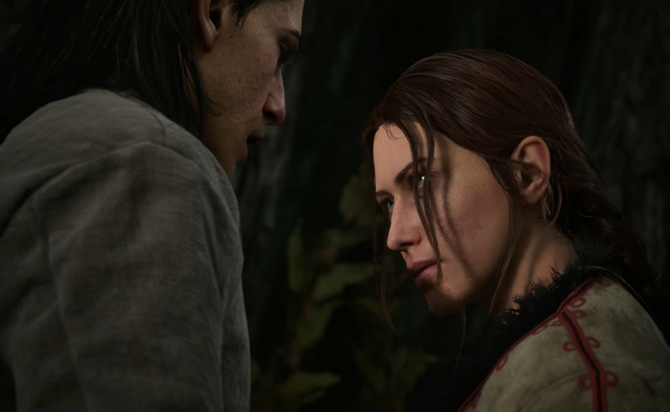 Two characters in close conversation in a dark setting, appearing tense or emotional