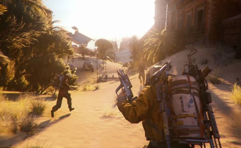 First-person view of armed player in desert town during PvPvE gameplay