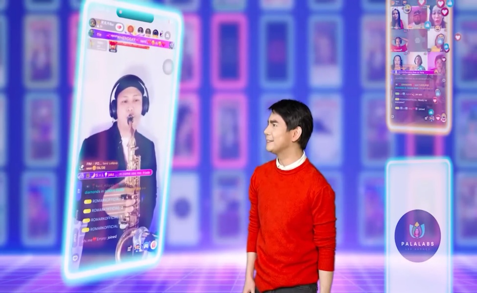 Young man in red shirt interacting with virtual live streaming interface display
