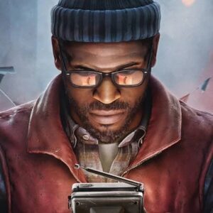 Man in glasses and red jacket holding vintage cassette player
