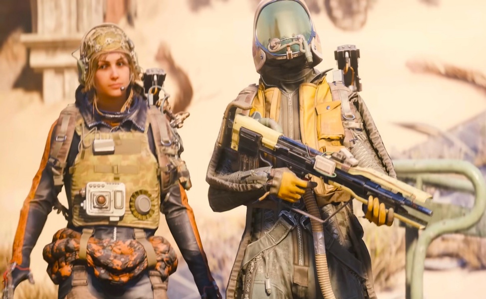 Two armored operators in tactical gear and helmets standing in a desert environment ready for combat